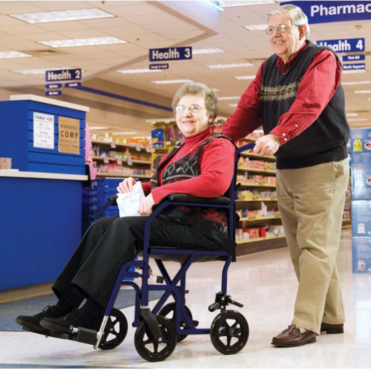 Carex Transport Wheelchair, Rolling Transport Wheelchair with 19-Inch Seat and Swing-away Footrest, Easy Folding for Compact Storage and Transportation, Supports up to 300 lbs with Padded Armrests and Seat Belt thumbnail 7