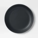 Set of four 6-inch black appetizer plates, perfect for serving snacks and appetizers.