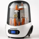 Baby Brezza Electric Steam Sterilizer and Dryer, white, sterilizing baby bottles and accessories.
