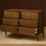 Baxton Studio Landis Dresser in Ash Walnut and Gold. Six drawers, gold knobs, mid-century modern style.