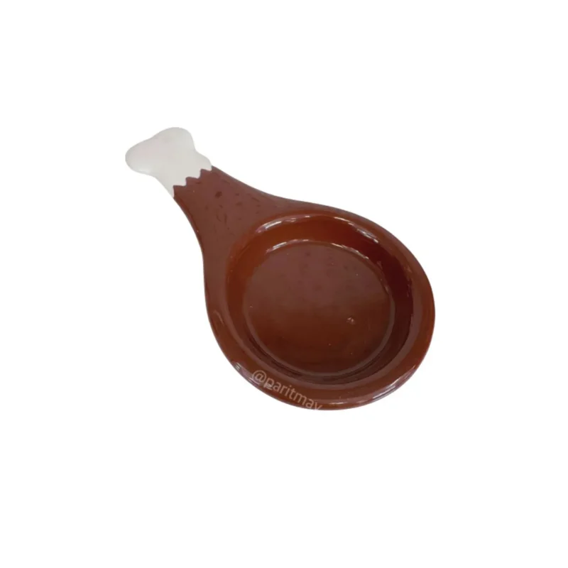 Adorable ceramic turkey leg spoon rest, perfect for your Thanksgiving dinner. Hand wash only.