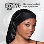Evolve Satin Edge Pocket Bonnet in black, protecting hair during sleep.