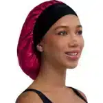 Firstline Evolve fuchsia pink satin bonnet with wide edge for hair protection.