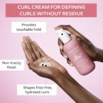 Two pink bottles of Function of Beauty's customizable curl cream for curly hair, formulated with Moringa oil.