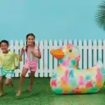 Colorful Sun Squad inflatable duck sprinkler, 3ft 4in long, perfect for summer fun in Toronto, Oakville, and Mississauga.
