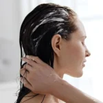 Kristin Ess The One Signature Conditioner, purple bottle, 10 oz, moisturizing, sulfate-free, paraben-free.