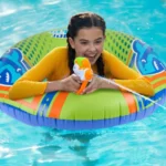 Nerf Super Soaker Hydro Battle Ride-On Cruiser inflatable pool float in blue, orange & white. Perfect for summer fun!