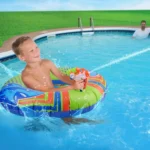 Nerf Super Soaker Hydro Battle Ride-On Cruiser inflatable pool float in blue, orange & white. Perfect for summer fun!