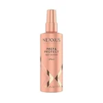 Nexxus Heat Defense Spray protects hair up to 450 degrees, delivering 72H humidity shield & 48H frizz control.