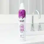 Not Your Mother's Curl Talk Curl Activating Mousse, 7 oz, white bottle, for defined, frizz-free curls.