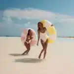 Yellow and white Sun Squad inflatable bungalow pool float, perfect for summer fun in Toronto, Oakville and Mississauga.