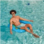 Sky blue SwimWays Spring Float Premium SunSeat inflatable pool chair for adults, perfect for relaxing in the sun.
