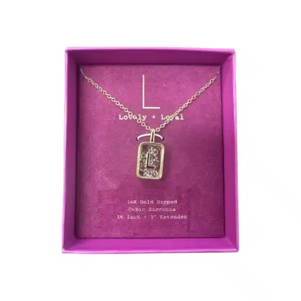 14K gold dipped cubic zirconia necklace on model, 16–19in Close-up of 14K gold dipped cubic zirconia necklace sparkle 14K gold dipped cubic zirconia necklace with extender clasp Gift-ready box with 14K gold dipped cubic zirconia necklace Layering look: 14K gold dipped cubic zirconia necklace