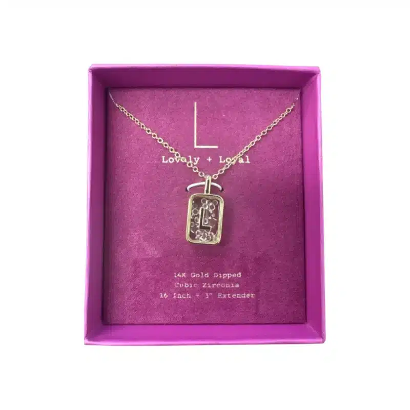 14K gold dipped cubic zirconia necklace on model, 16–19in Close-up of 14K gold dipped cubic zirconia necklace sparkle 14K gold dipped cubic zirconia necklace with extender clasp Gift-ready box with 14K gold dipped cubic zirconia necklace Layering look: 14K gold dipped cubic zirconia necklace