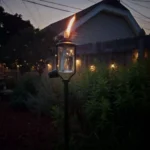BRAND NEW TIKI Convertible Torch, 69"/54", clear glass, black metal, adds ambiance to your garden.