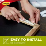 16 pairs of white Command small picture hanging strips for creating gallery walls, easy to use and damage-free.