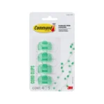 Four clear Command damage-free cord clips with adhesive strips. Organize your cables easily!