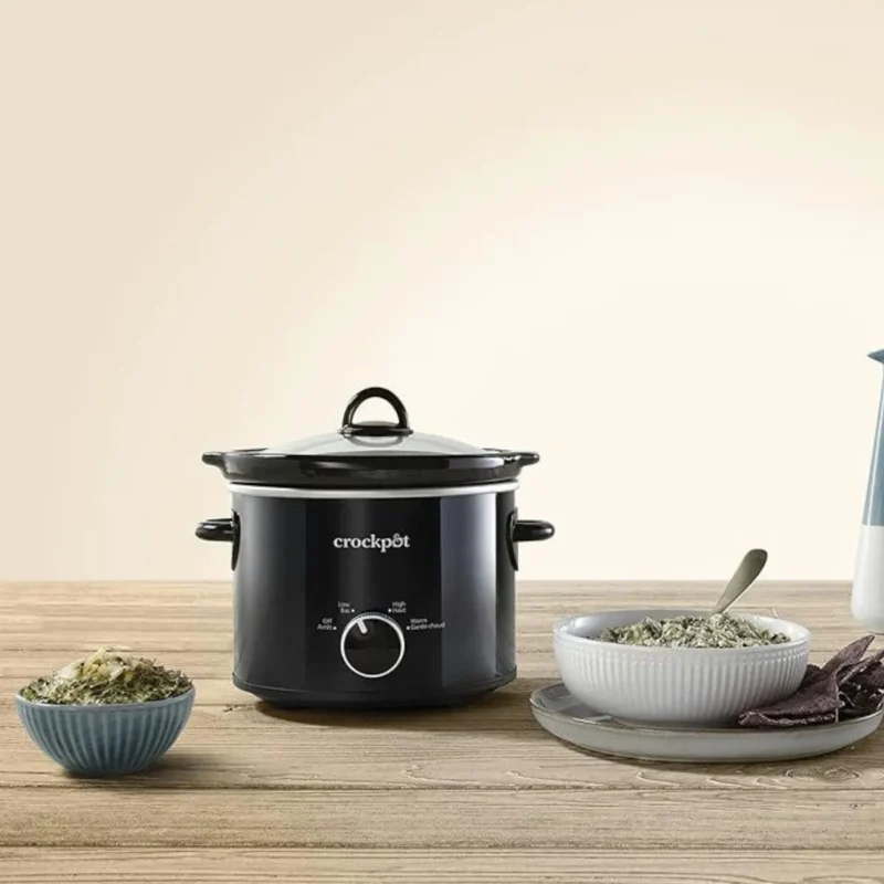 Silver/Black 2-quart slow cooker with cool-touch handles, perfect for small kitchens in Toronto.