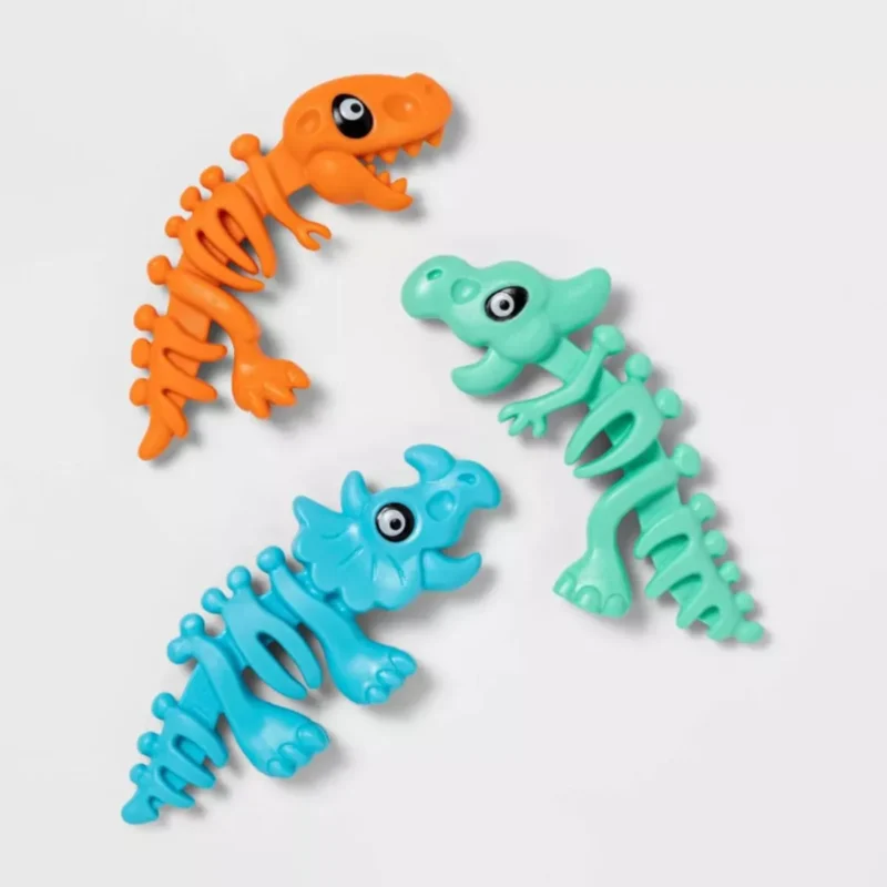 Three colorful dinosaur dive toys for kids, perfect for summer pool fun in Toronto, Oakville, and Mississauga.