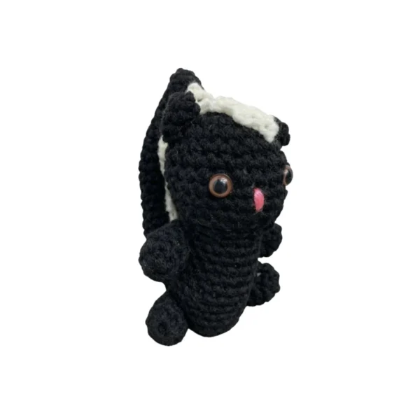 Adorable handmade felt skunk plush toy with striped scarf, perfect for kids and collectors.