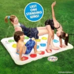 Kids playing the Hasbro Twister Splash water game in a sunny backyard.