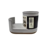 Cream and clay colored Hearth & Hand Magnolia stoneware kitchen sink caddy, organizing dish soap and sponges.