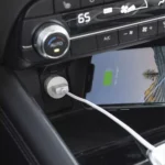 Black 4ft coiled lightning car charger with fast charging and LED indicator, MFi Certified.