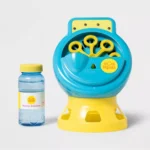 Magenta Sun Squad™ Light-Up Bubble Maker creating vibrant, colorful bubbles outdoors.