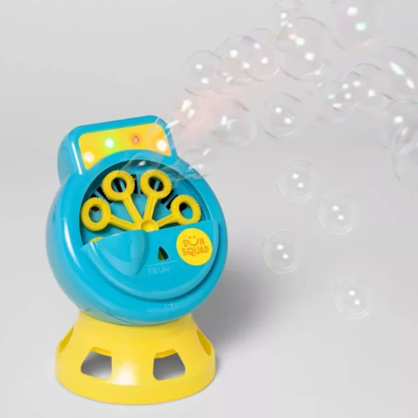 Magenta Sun Squadâ„¢ Light-Up Bubble Maker creating vibrant, colorful bubbles outdoors.
