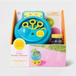 Magenta Sun Squad™ Light-Up Bubble Maker creating vibrant, colorful bubbles outdoors.
