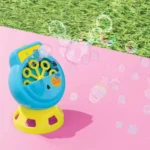 Magenta Sun Squad™ Light-Up Bubble Maker creating vibrant, colorful bubbles outdoors.