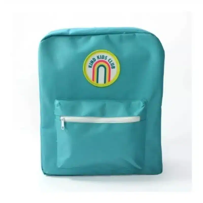 Adorable kids wearing Mint Kind Club clothing, smiling happily.