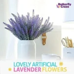 Modern white ceramic pot with a realistic faux lavender arrangement. Perfect tabletop accent for Toronto homes.