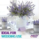 Modern white ceramic pot with a realistic faux lavender arrangement. Perfect tabletop accent for Toronto homes.
