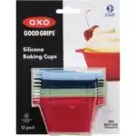 Set of 12 colorful OXO Good Grips silicone baking cups, reusable and non-stick.