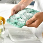 Pink and black silicone ice cubes, perfect for chilling drinks. Shop now in Toronto, Oakville & Mississauga!
