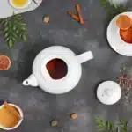 Classic white RSVP International 16oz stoneware teapot, microwave & dishwasher safe. Enjoy the perfect cuppa!