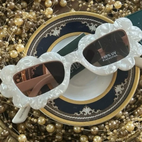 Vintage Wild Fable pearlized lucite sunglasses with UV protection. Stylish and retro.
