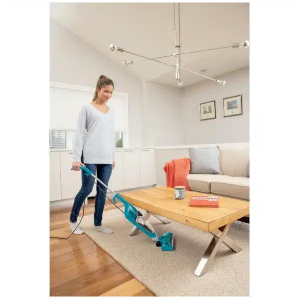 Bissell vacuum cleaning hardwood floors Bissell vacuum close-up of suction head Bissell vacuum lightweight design side view Bissell vacuum removing dust from carpet Bissell vacuum easy-to-empty dust container