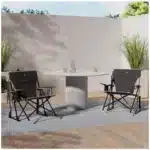 GCI Outdoor camping chair at a forest campsite GCI Outdoor camping chair folded for easy carry GCI Outdoor camping chair lightweight portable design GCI Outdoor camping chair durable frame close-up GCI Outdoor camping chair compact storage in trunk