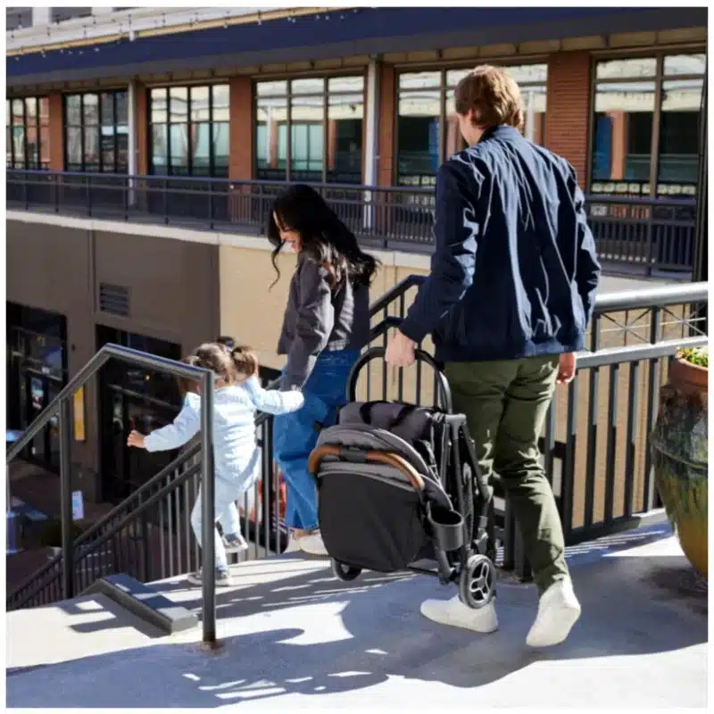 Graco Ready2Jet Compact Stroller automatic fold in action Graco Ready2Jet Compact Stroller folded for travel Graco Ready2Jet Compact Stroller side profile compact design Graco Ready2Jet Compact Stroller handle and canopy detail Graco Ready2Jet Compact Stroller travel-ready design