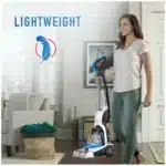 Hoover vacuum cleaner on hardwood floors Hoover vacuum cleaner lightweight design view Hoover vacuum cleaner cleaning carpet fibers Hoover vacuum cleaner brush head close-up Hoover vacuum cleaner compact storage profile