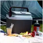 Koolatron mini fridge compact design front view Koolatron mini fridge interior with snacks and drinks Koolatron mini fridge for dorm room or office desktop Koolatron mini fridge energy-efficient countertop unit Koolatron mini fridge portable travel and home use