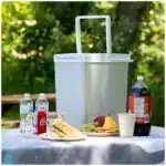 Koolatron cooler portable unit front view Koolatron cooler in a home or office setting Koolatron cooler compact design close-up Koolatron cooler packed for travel and road trips Koolatron cooler lifestyle scene at a picnic