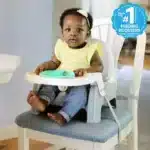 Ingenuity Deluxe Learn-to-Dine Feeding Seat, Twist & Dine Plate, Booster Seat, For Ages 6 Months - 3 Years - Orange & Teal