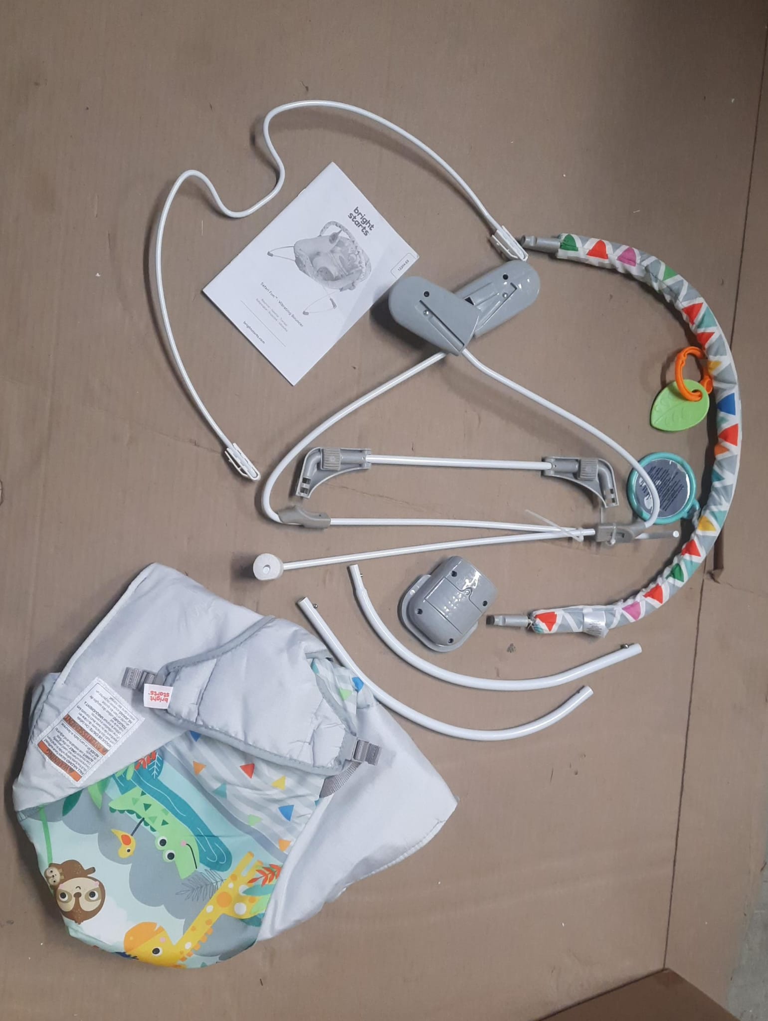 Bright baby bouncer soothing vibrations in safari fun design