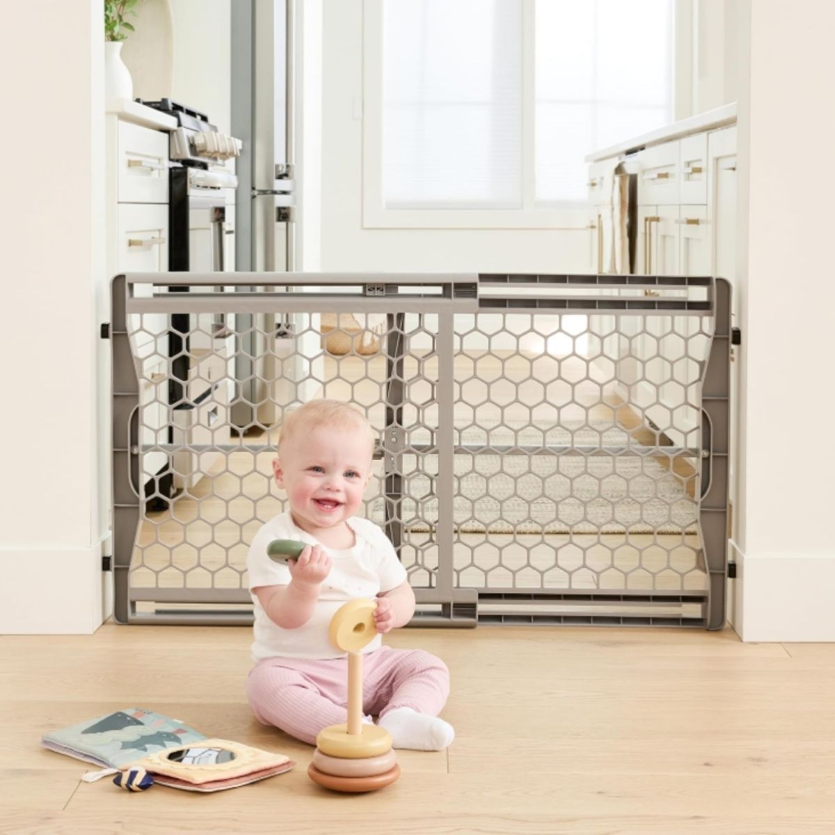 Extra Wide Baby Gate - Regalo Adjustable White Regalo extra wide baby gate in white plastic pressure-mounted design