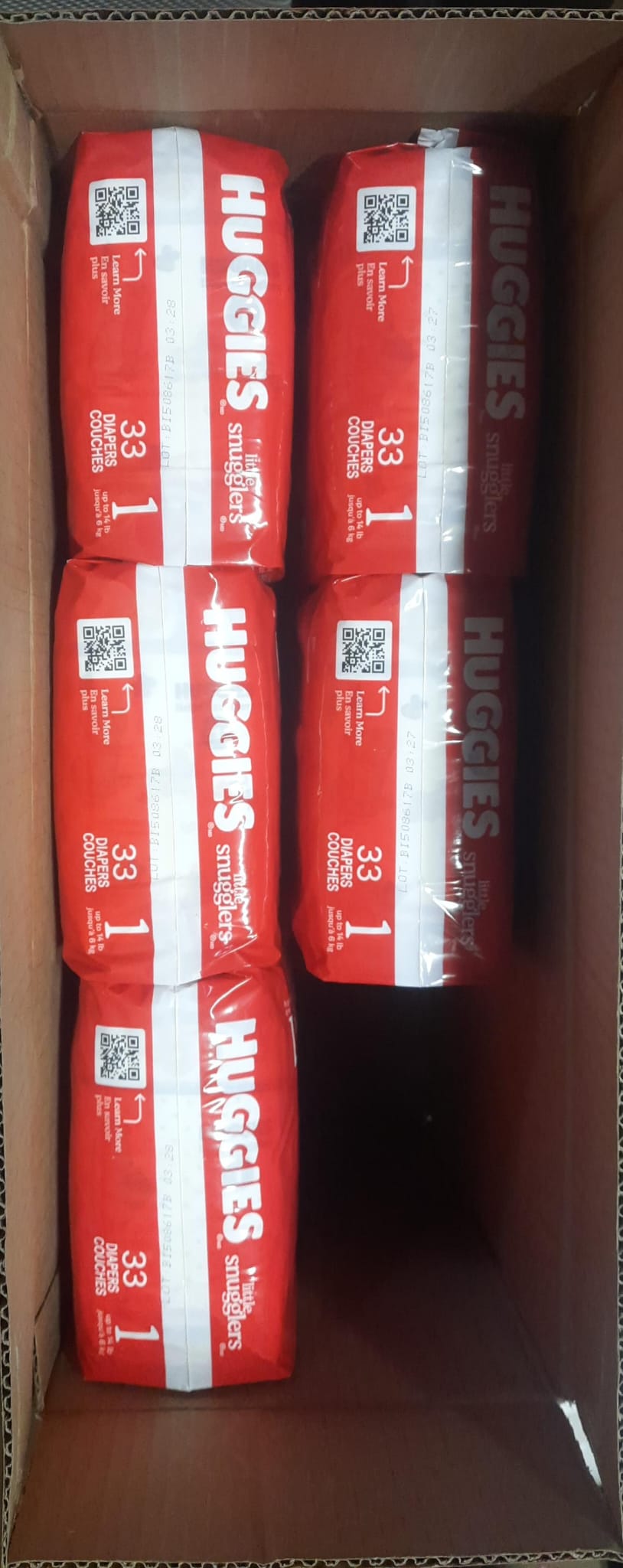 Huggies size 1 diapers package showing 198 count in packaging