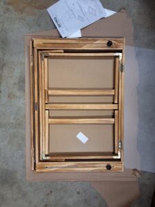 Tektalk puzzle table with adjustable LED light and folding legs in natural wood