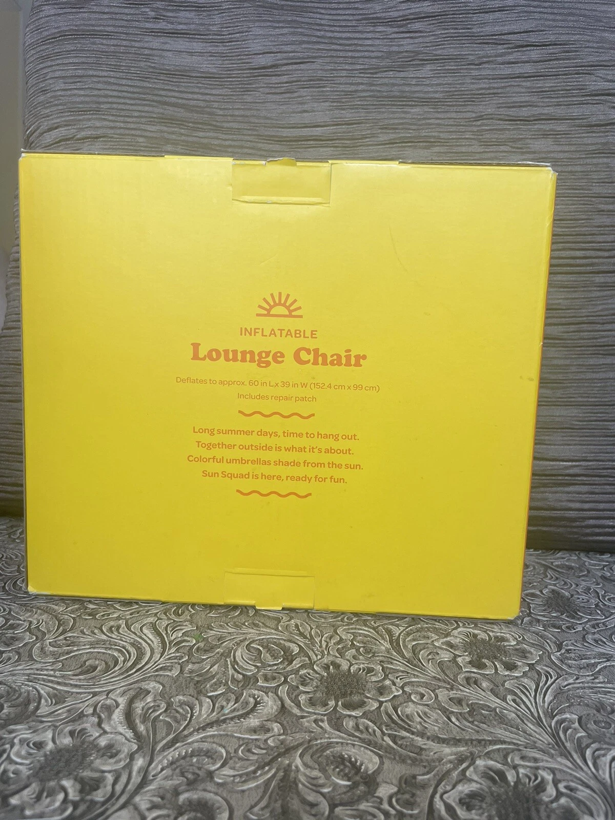 Sun inflatable lounge chair in bright blue with cup holders